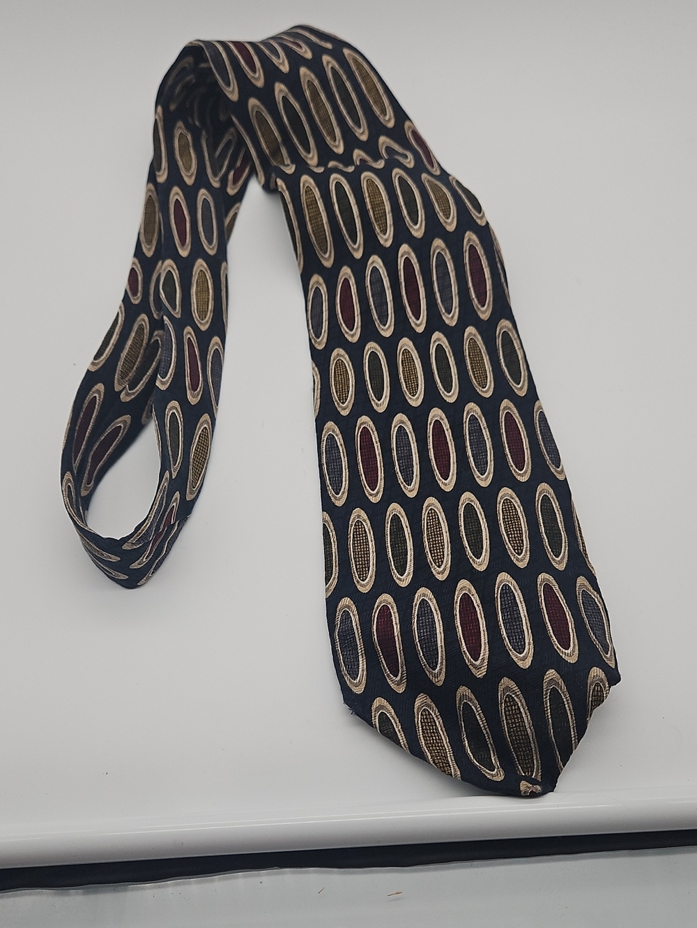 Jos. A. Bank Black Silk Tie with Gold and Burgundy Oval Pattern